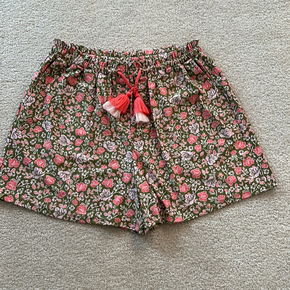 Olive green and pink satin feel draw string shorts. Side pockets. Cabana life